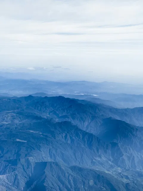 Forested mountain formations photographed from above in the Dominican Republic