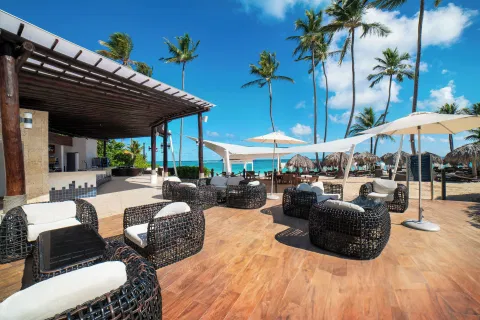Beachside terrace overlooking the ocean at Royalton Hideaway Punta Cana in Arena Gorda