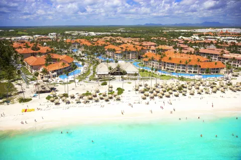 Aerial view of Majestic Elegance Punta Cana resort buildings, beach and pools