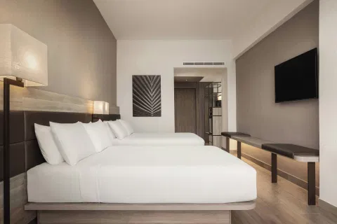 Guest room interior at AC Hotel Punta Cana