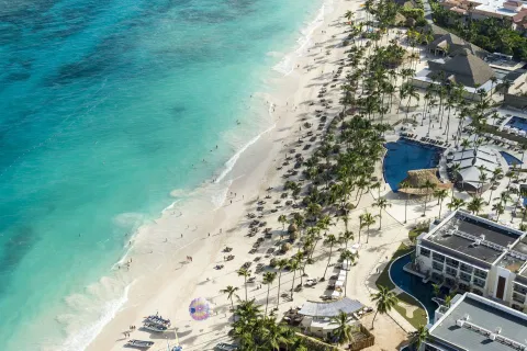 Aerial view of the beach, swimming pool and resort grounds at Royalton Punta Cana