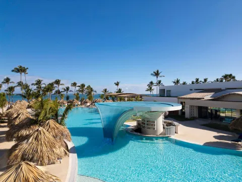 Pool terrace and resort grounds at Serenade All Suites adults-only resort